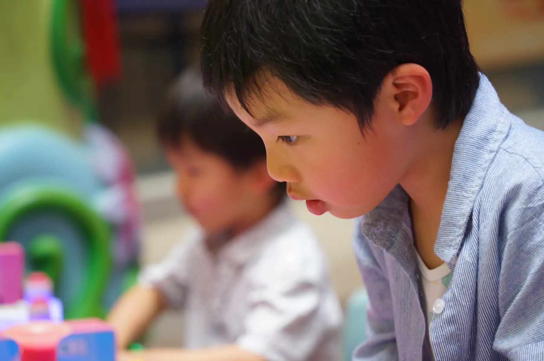 Close portrait of a child at play
