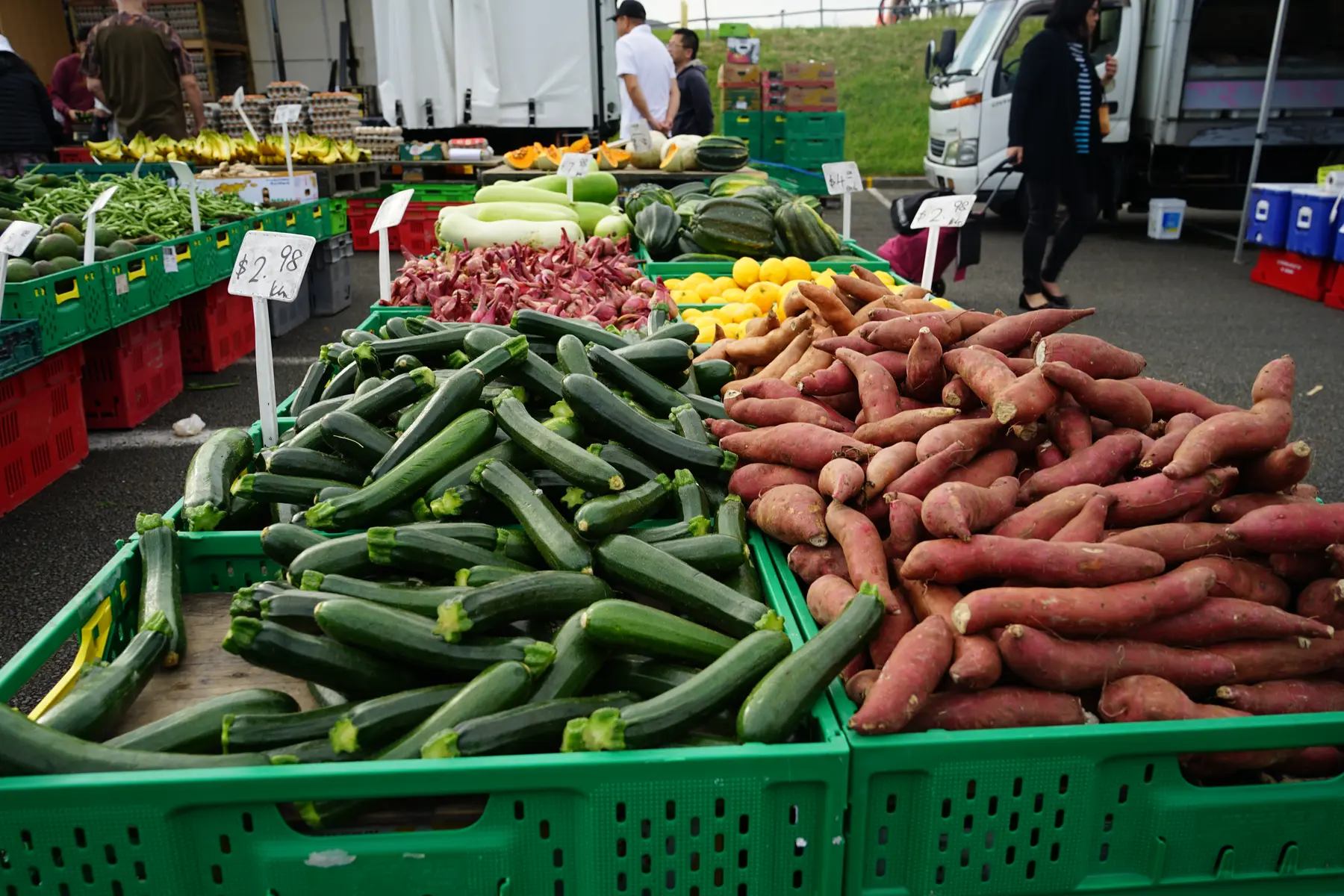 Fresh vegetables arranged at an outdoor market